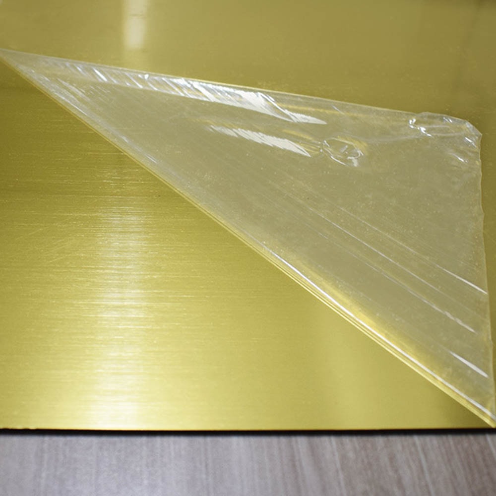 Chapa ABS Dupla Camada Escovado Dourado/Preto - 610x300x1.5mm Chapa ABS Dupla Camada Escovado Dourado/Preto - 610x300x1.5mm